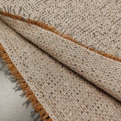 Altrosa Bouclé-Stoff mit Pailletten