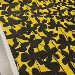 Gelb-schwarzer Leinen-Baumwollstoff mit schwarzem Blattmuster